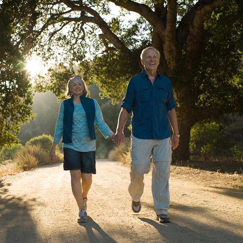 Couple walking on a Florida hike for brain health